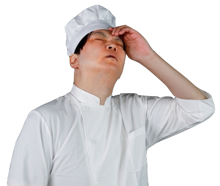 悩んでいるシェフ